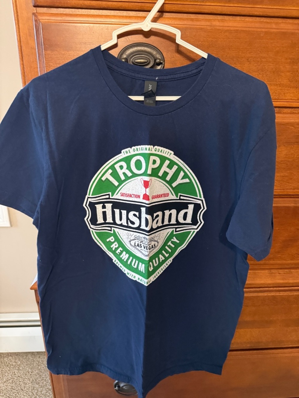 Gildan Navy Blue 'Trophy Husband' Graphic Tee with Green and White Logo